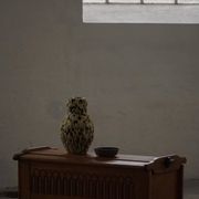 Modern Danish oak commode with decorative relief sculpture, mid-20th century.
