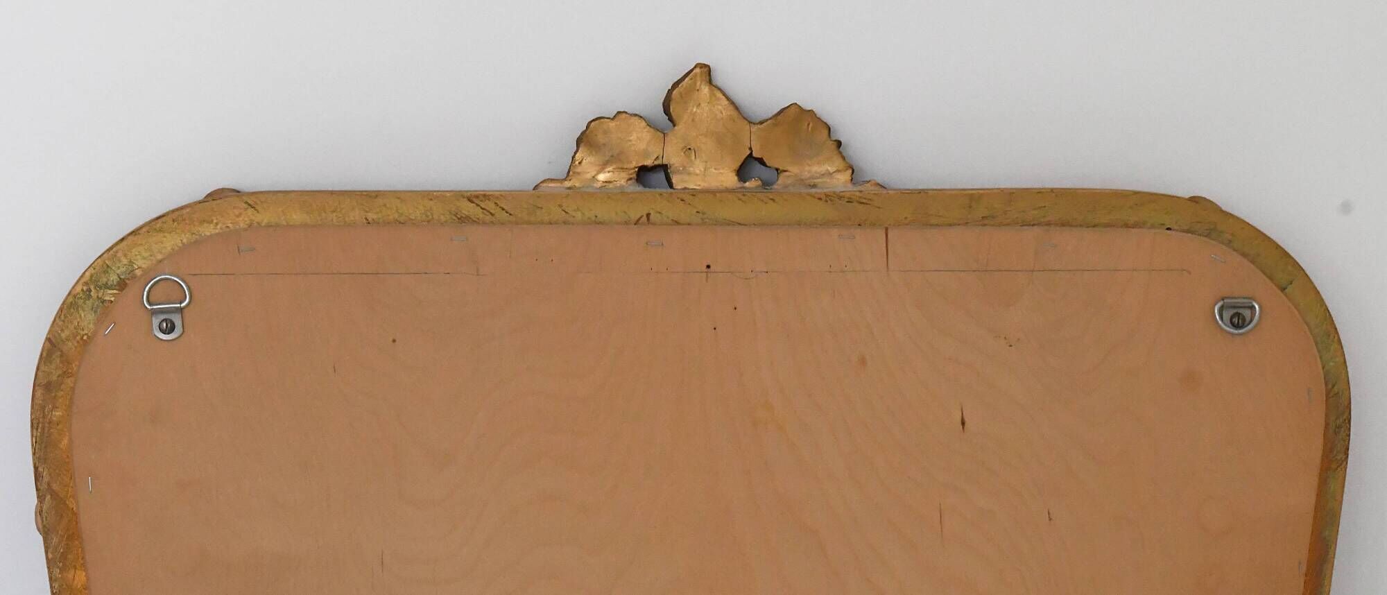 Wooden mirror and gilded stucco decorated with rockery style rinceaux and shells
