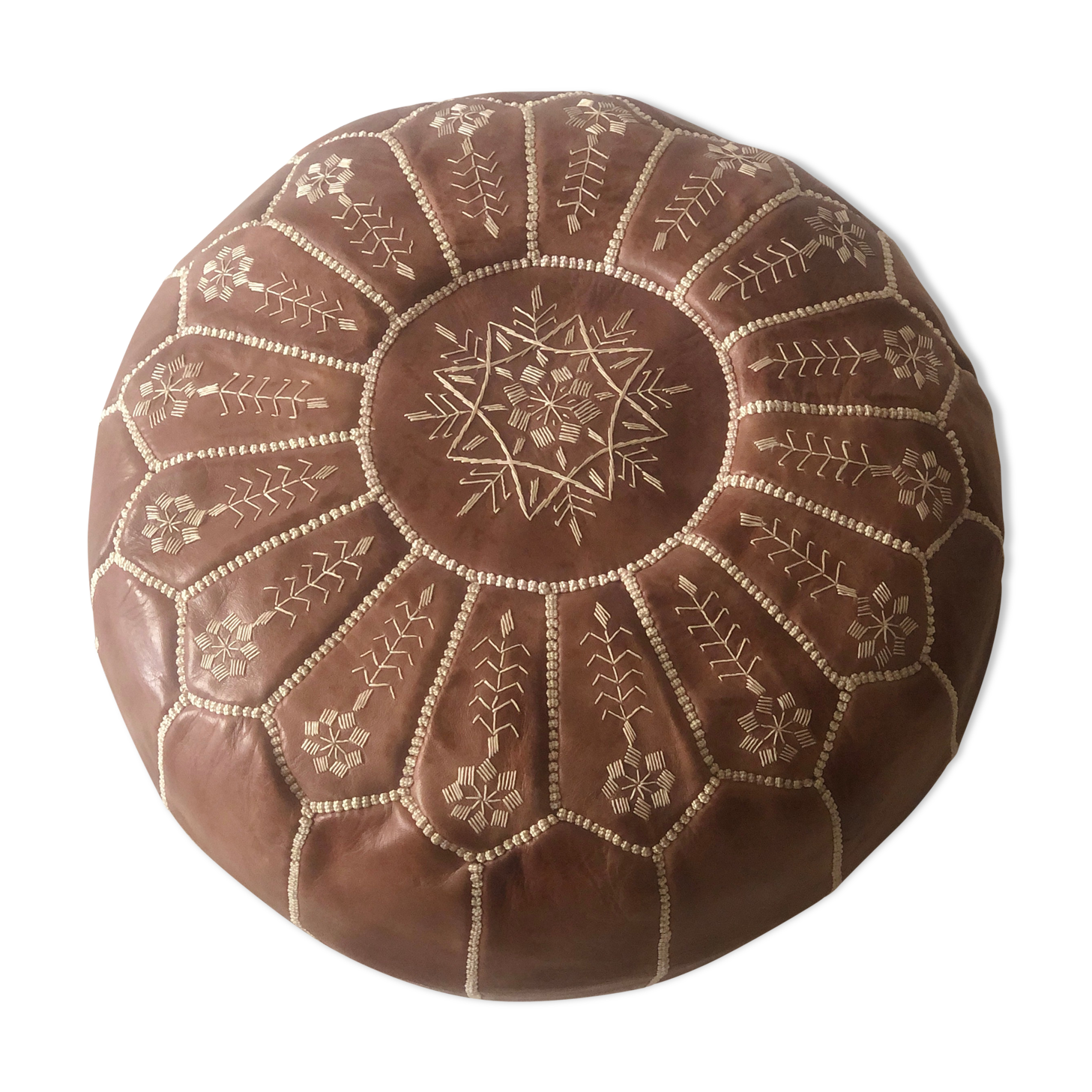 Moroccan-style brown leather pouf