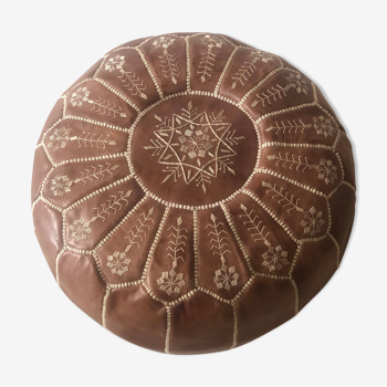 Moroccan-style brown leather pouf