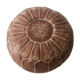 Moroccan-style brown leather pouf
