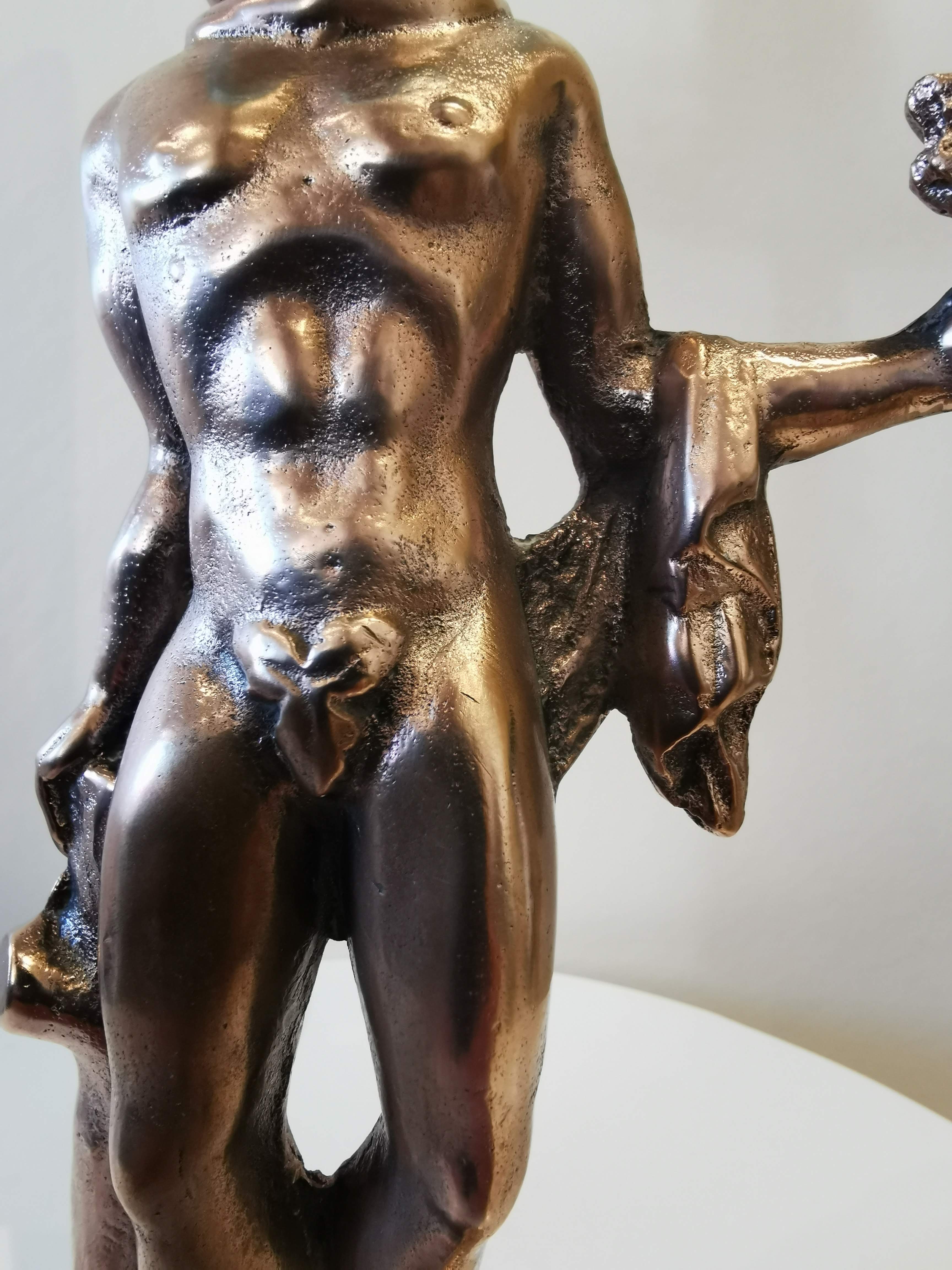 Large kerosene lamp mounted on bronze statue. Late nineteenth century