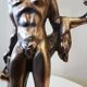 Large kerosene lamp mounted on bronze statue. Late nineteenth century