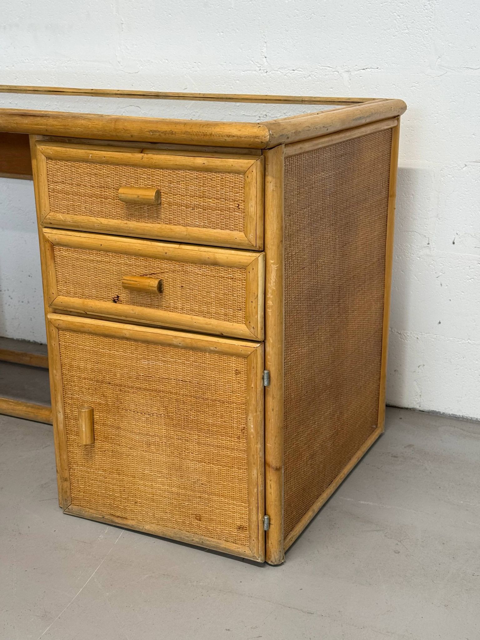 Vintage bamboo and woven rattan desk — glass top