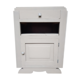 Wooden bedside drawer and a door