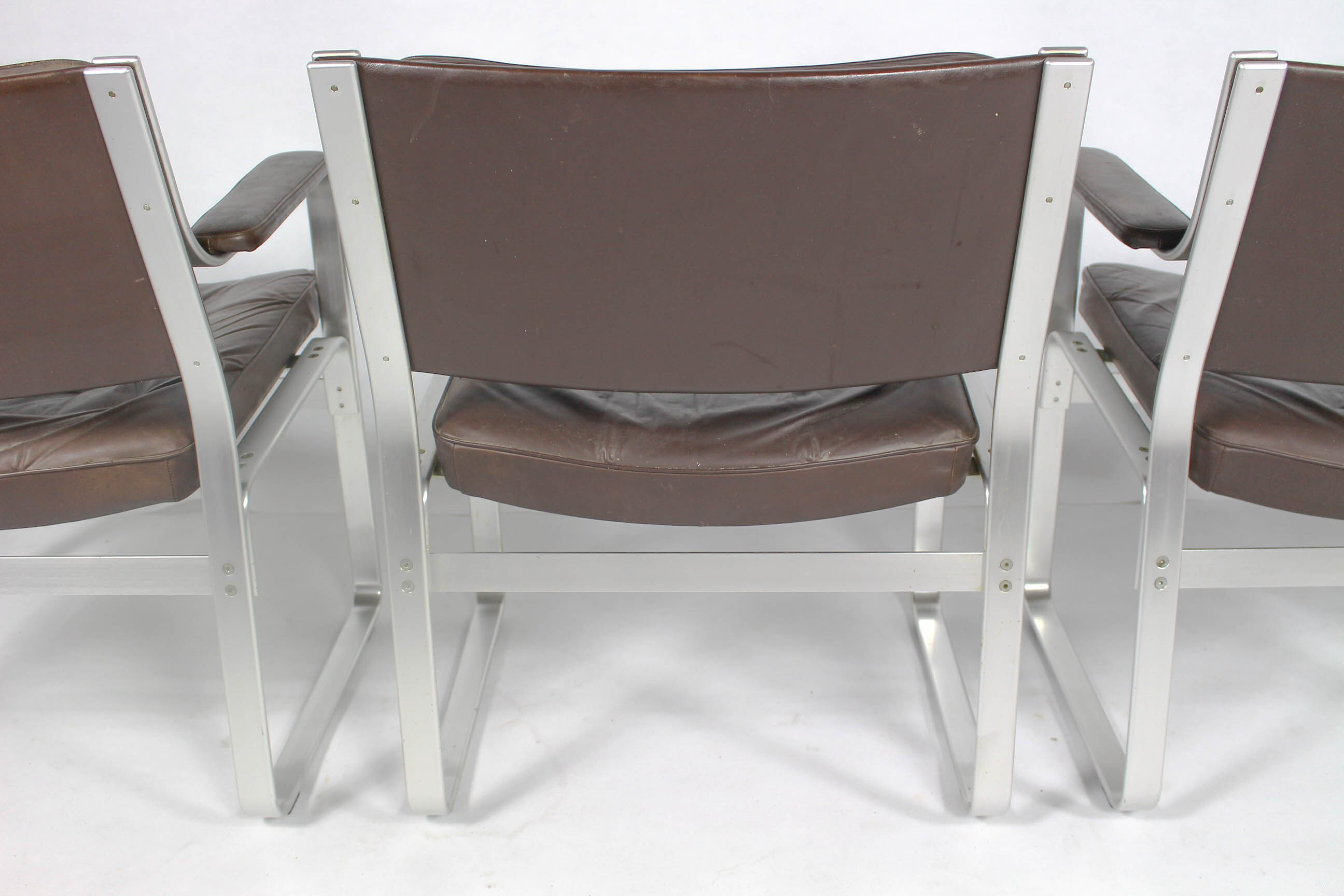 Swedish Mid Century Leather And Aluminum Armchairs By Karl Erik Ekselius For Joc Vetlanda, Set Of 4