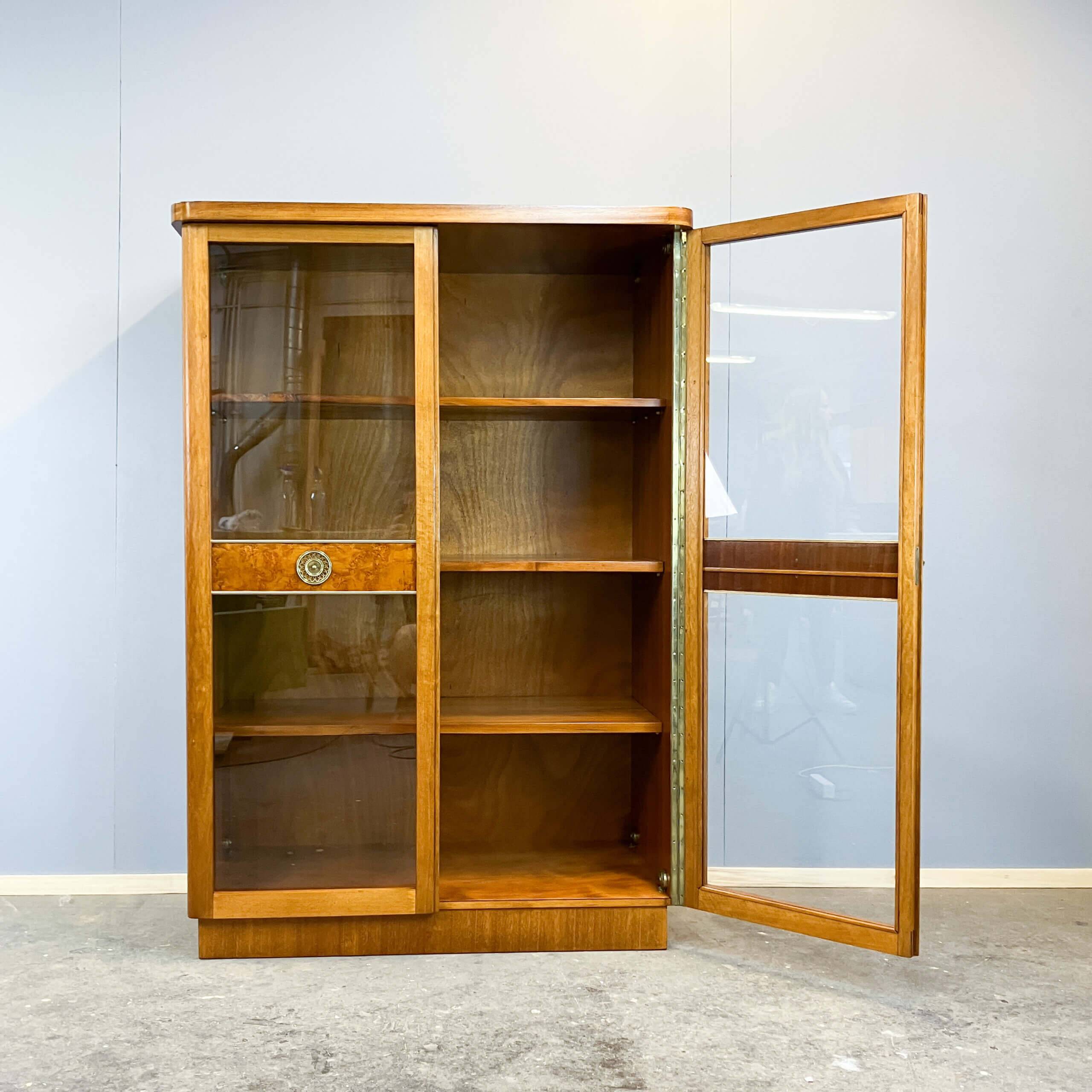 Art Deco cabinet with glass doors, various woods, 1930s