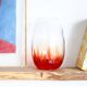 Vintage blown glass vase with a speckled red design