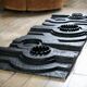 Wall sculpture, wood and black coating, late 1970s