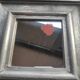 Vintage square mirror in wood covered with metal leaf, moldings in relief