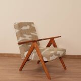 Pair of vintage lounge chairs in brown jacquard fabric and wood.