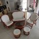 Sofa armchairs and coffee table in vintage rattan of six pieces