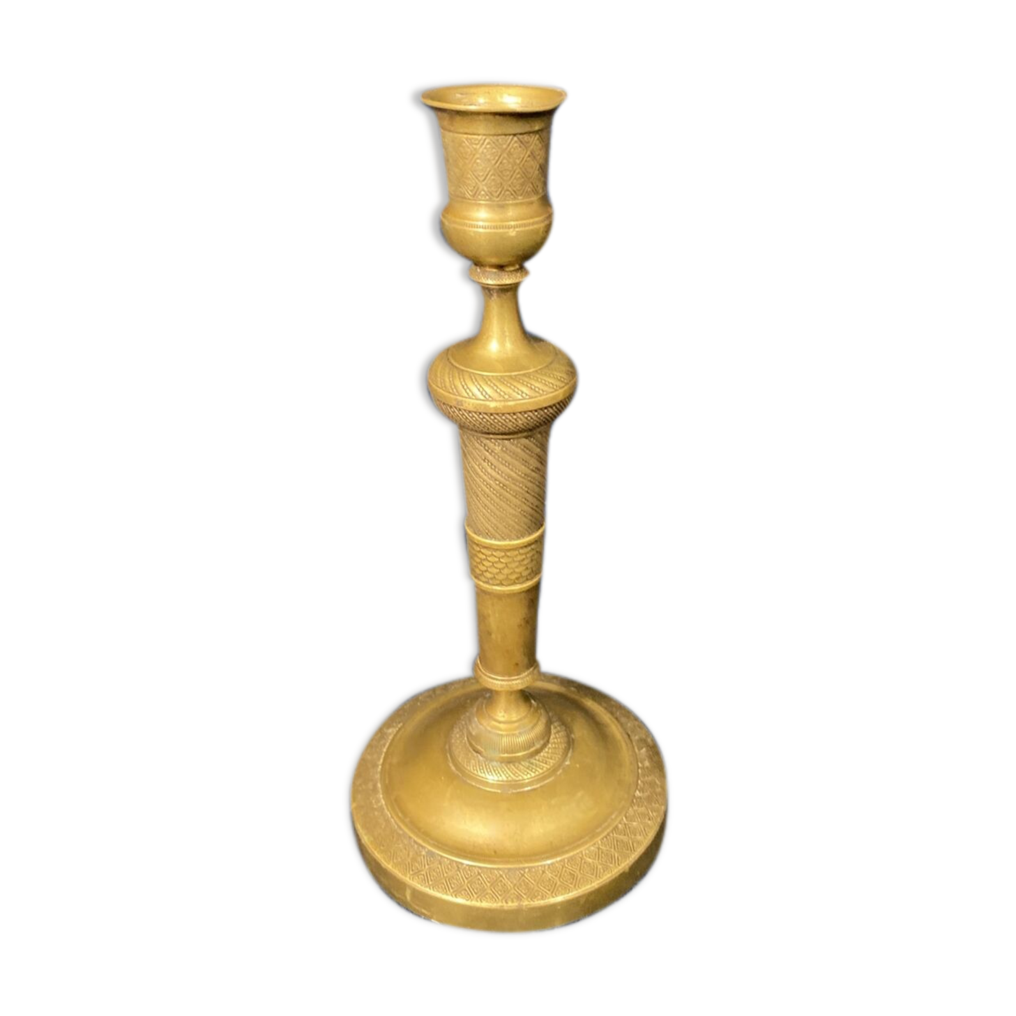Old Louis-style brass candlestick