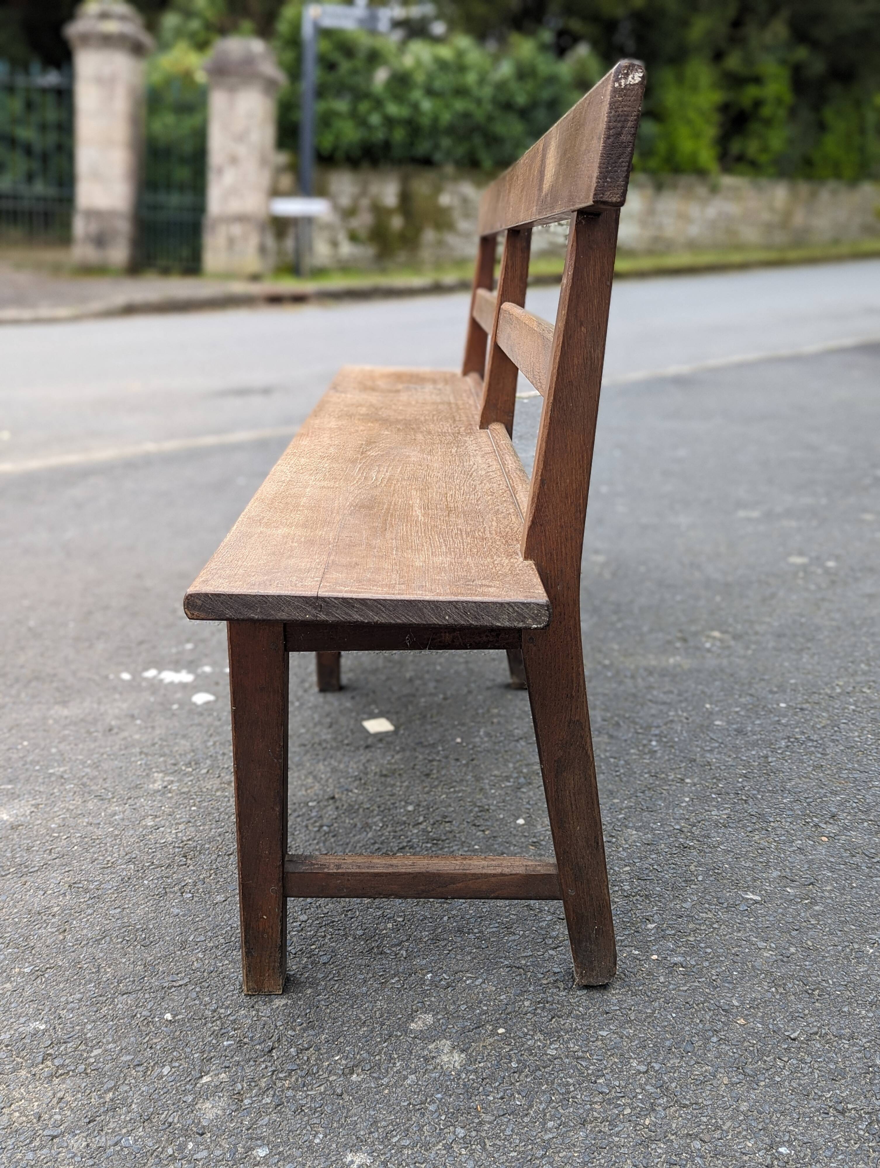 Large oak bench with back