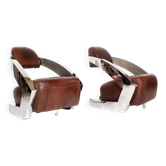 Pair of vintage lounge chairs Demon/Aviator in cognac leather and polished steel, Art Deco style.