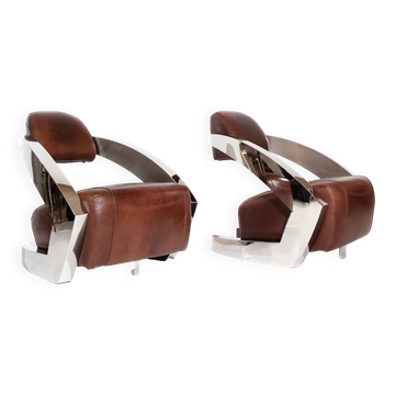 Pair of vintage lounge chairs Demon/Aviator in cognac leather and polished steel, Art Deco style.