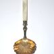 Empire sprinkling spoon in gilded silver vermeil and mother-of-pearl, 19th century.