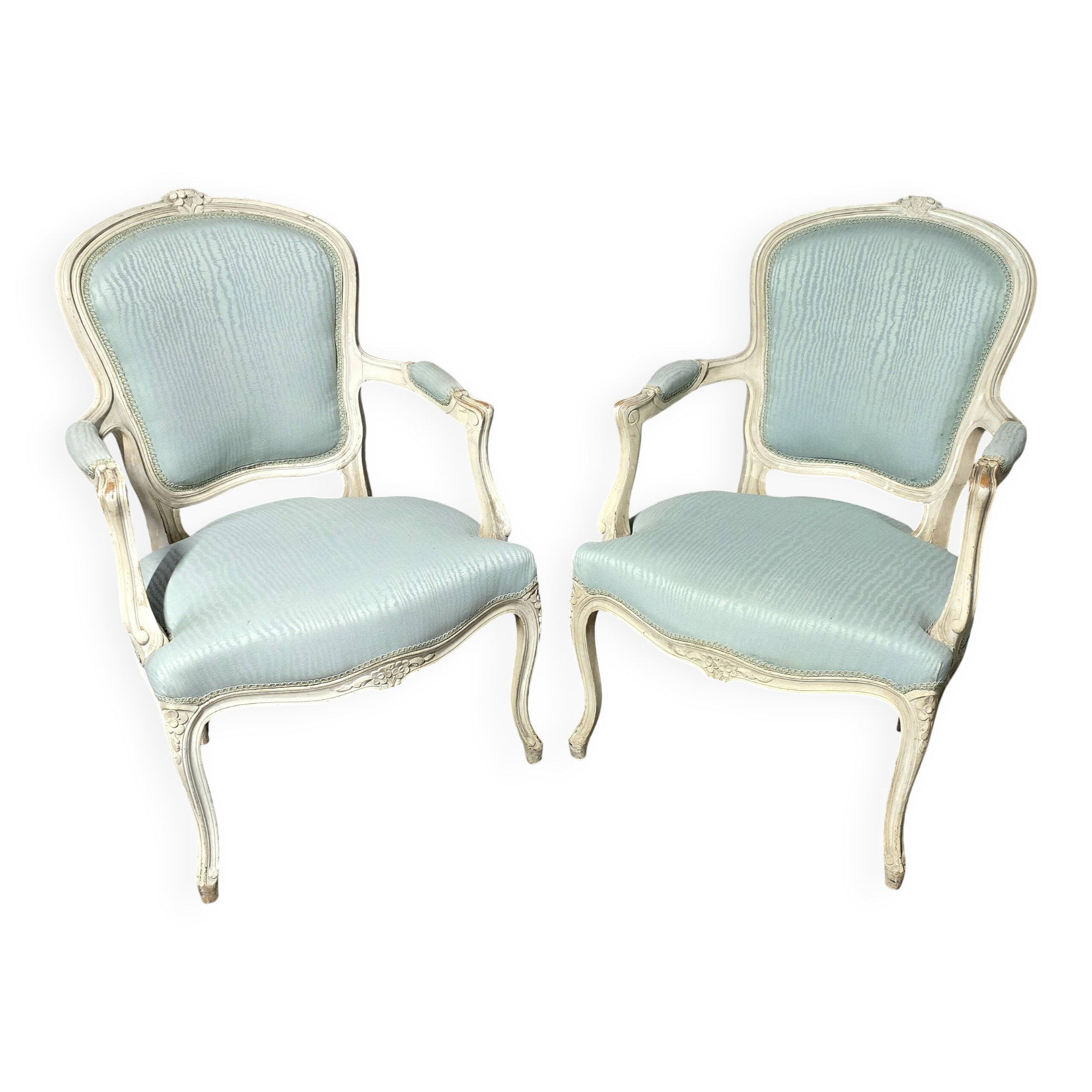 Pair of Louis XV style armchairs in patinated wood, light blue fabric.