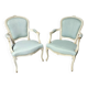 Pair of Louis XV style armchairs in patinated wood, light blue fabric.
