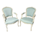 Pair of Louis XV style armchairs in patinated wood, light blue fabric.