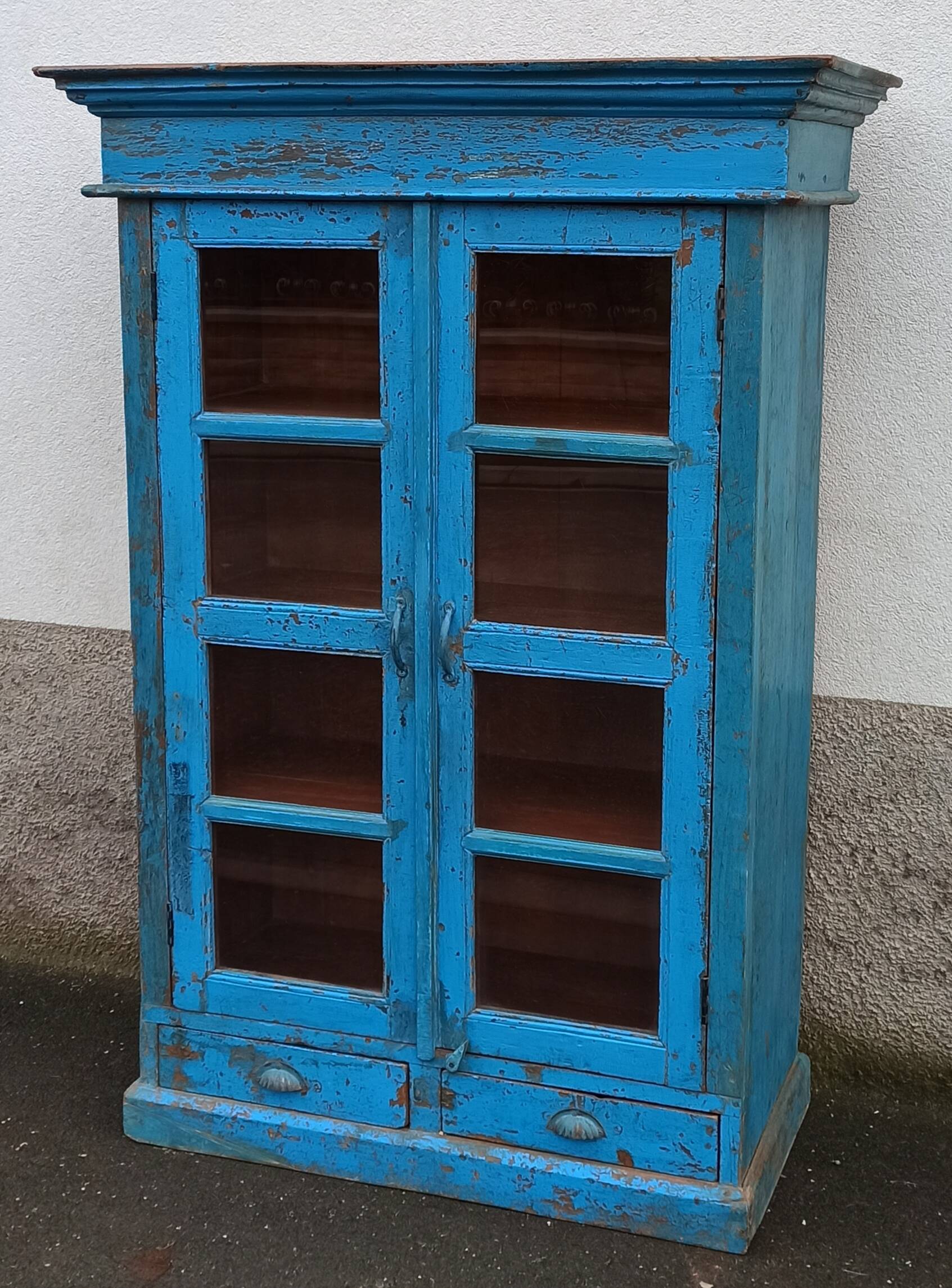 Old wooden glazed cabinet with two doors and two drawers