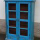 Old wooden glazed cabinet with two doors and two drawers