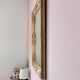 Richly carved antique gilded mirror