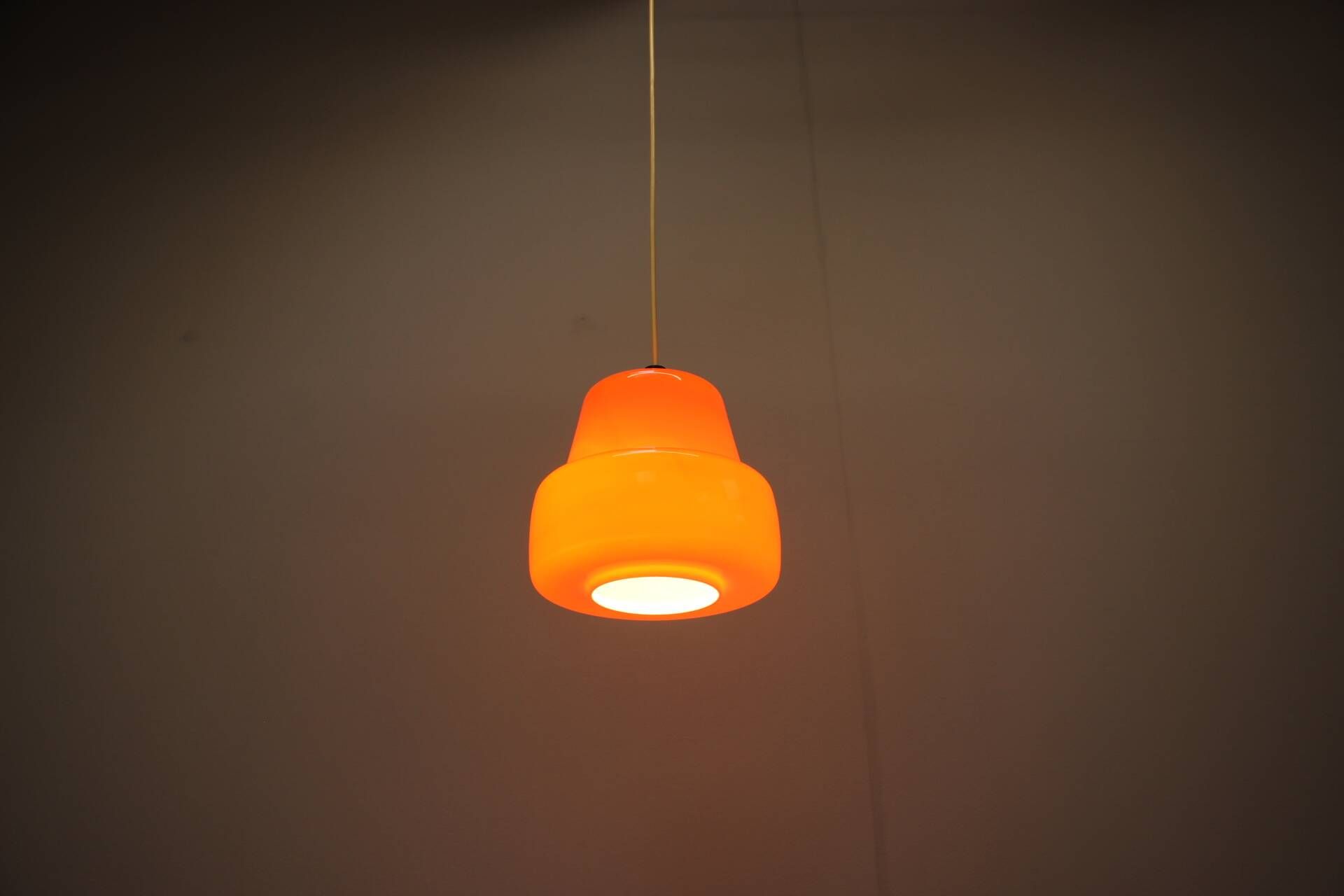 Vintage orange glass pendant lamp, Czechoslovakia, circa 1970.