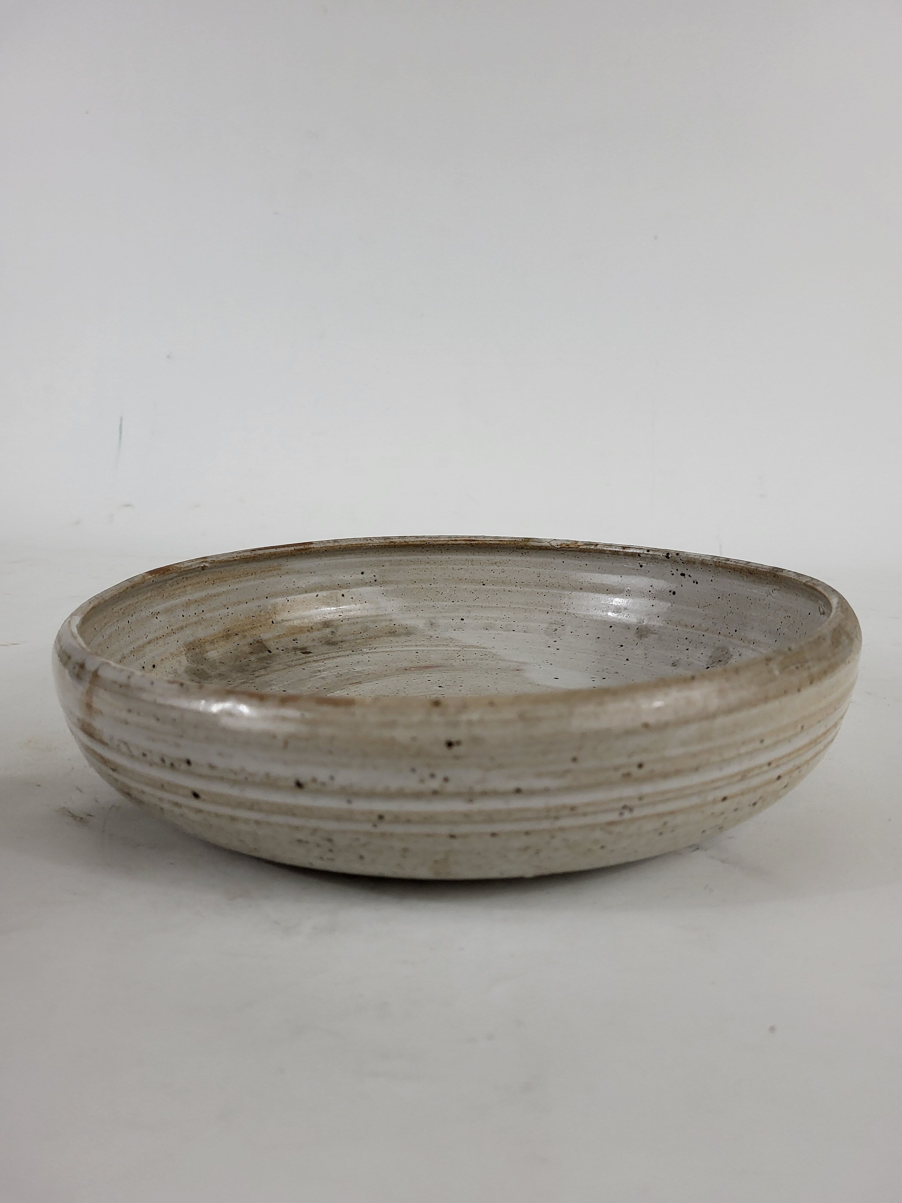 Hollow stoneware dish signed Pierre lion Puisaye