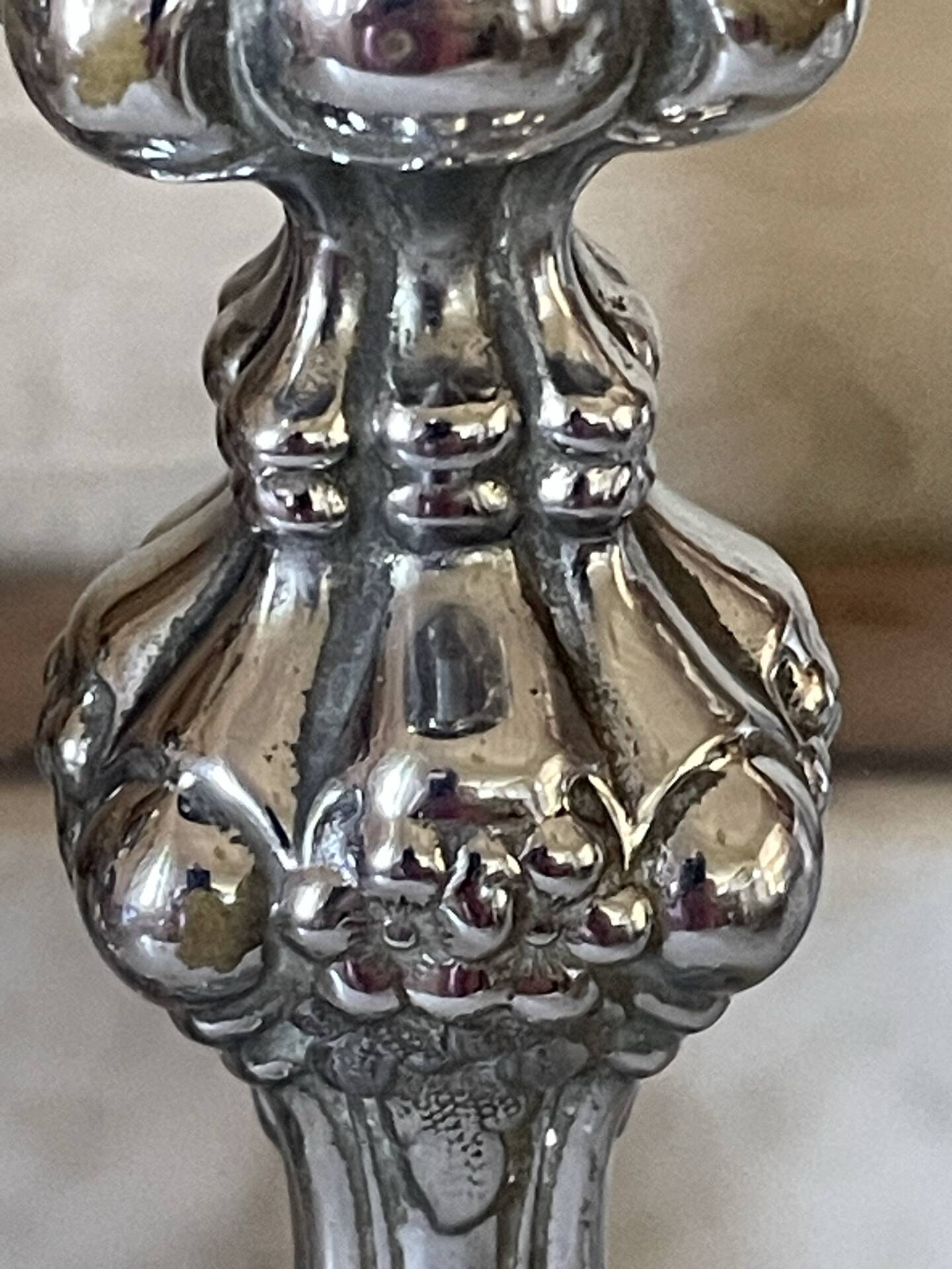 Pair of rococo silver-plated candlesticks