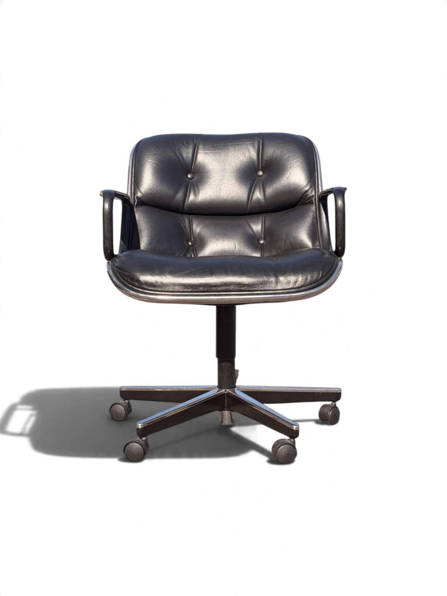Charles Pollock Executive Knoll office chair in black leather.