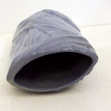 Purple vase, draped ribbons in relief