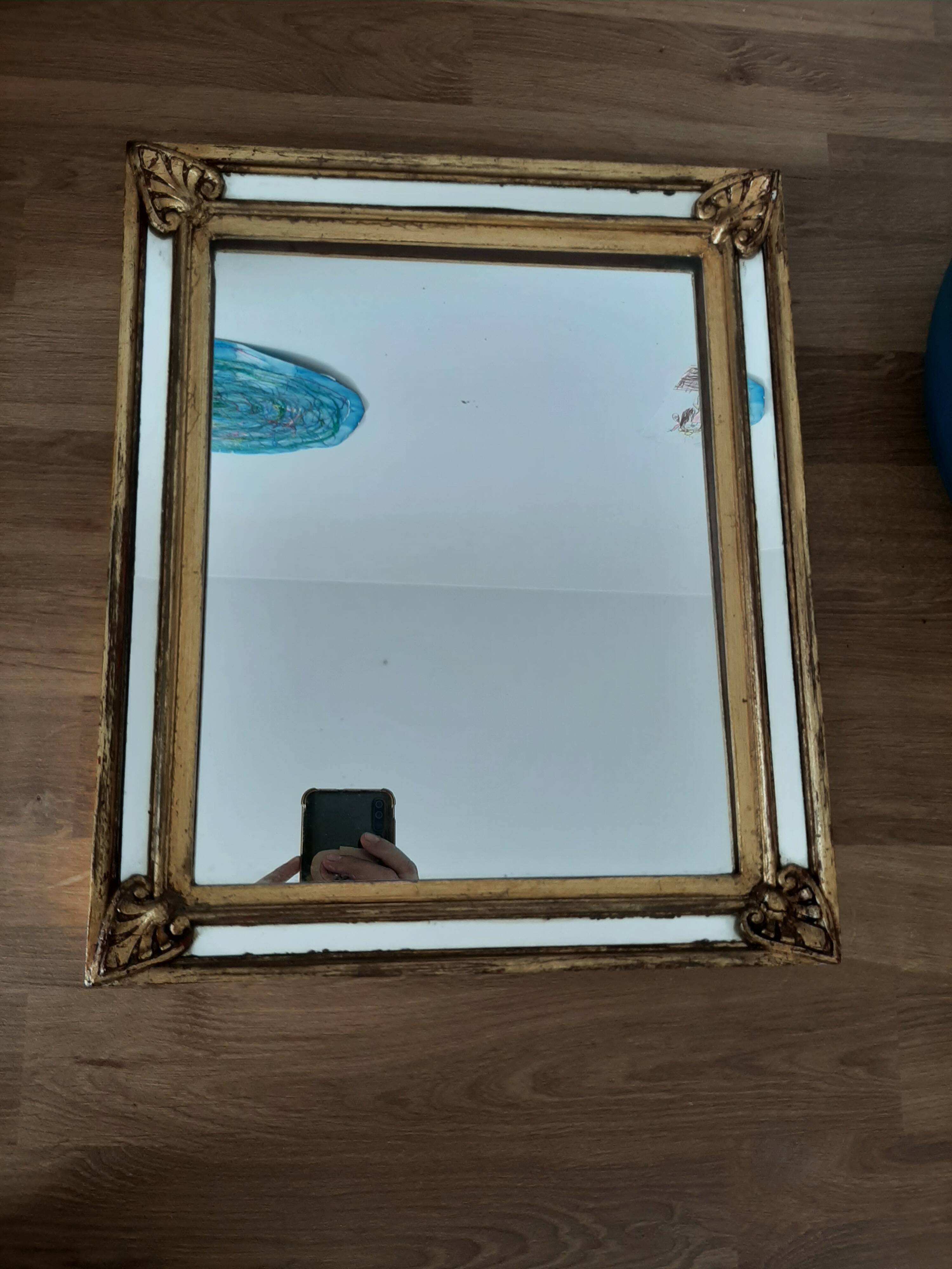 Gold-framed mirror