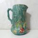 Antique turquoise Art Deco majolica pitcher vase with a snake motif