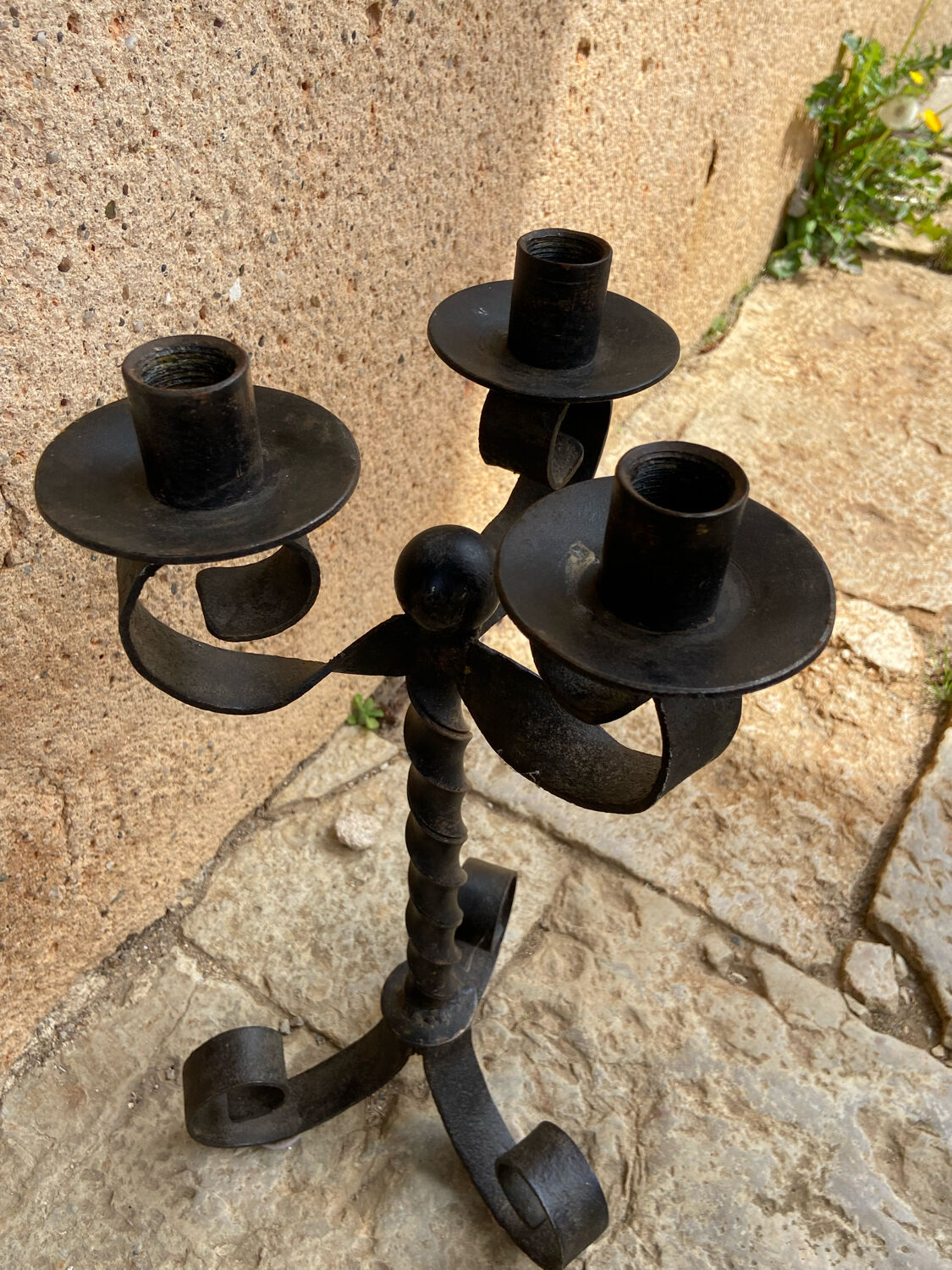 Antique wrought iron candle holder