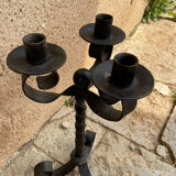 Antique wrought iron candle holder