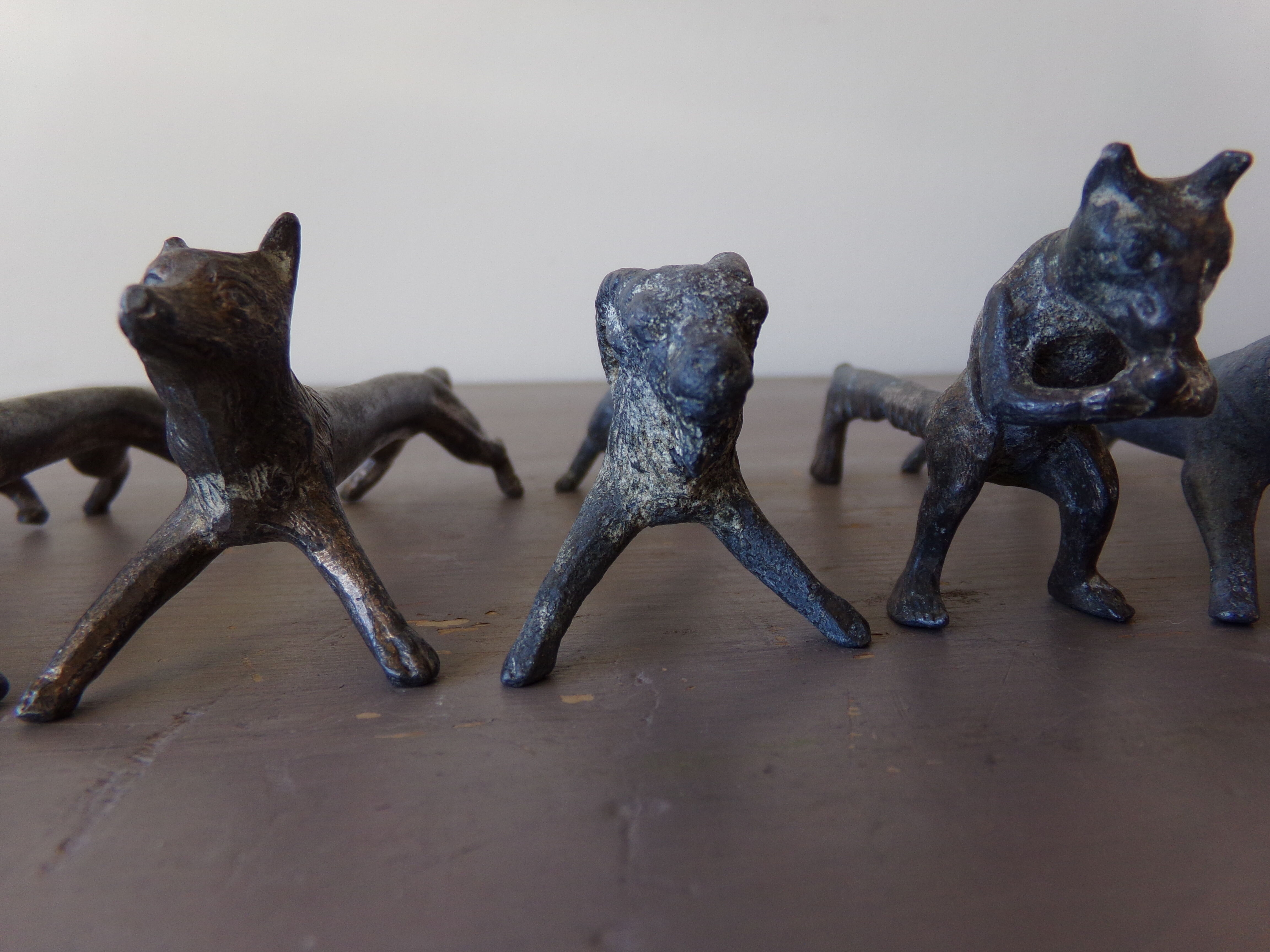 8 antique tin animal knife holders