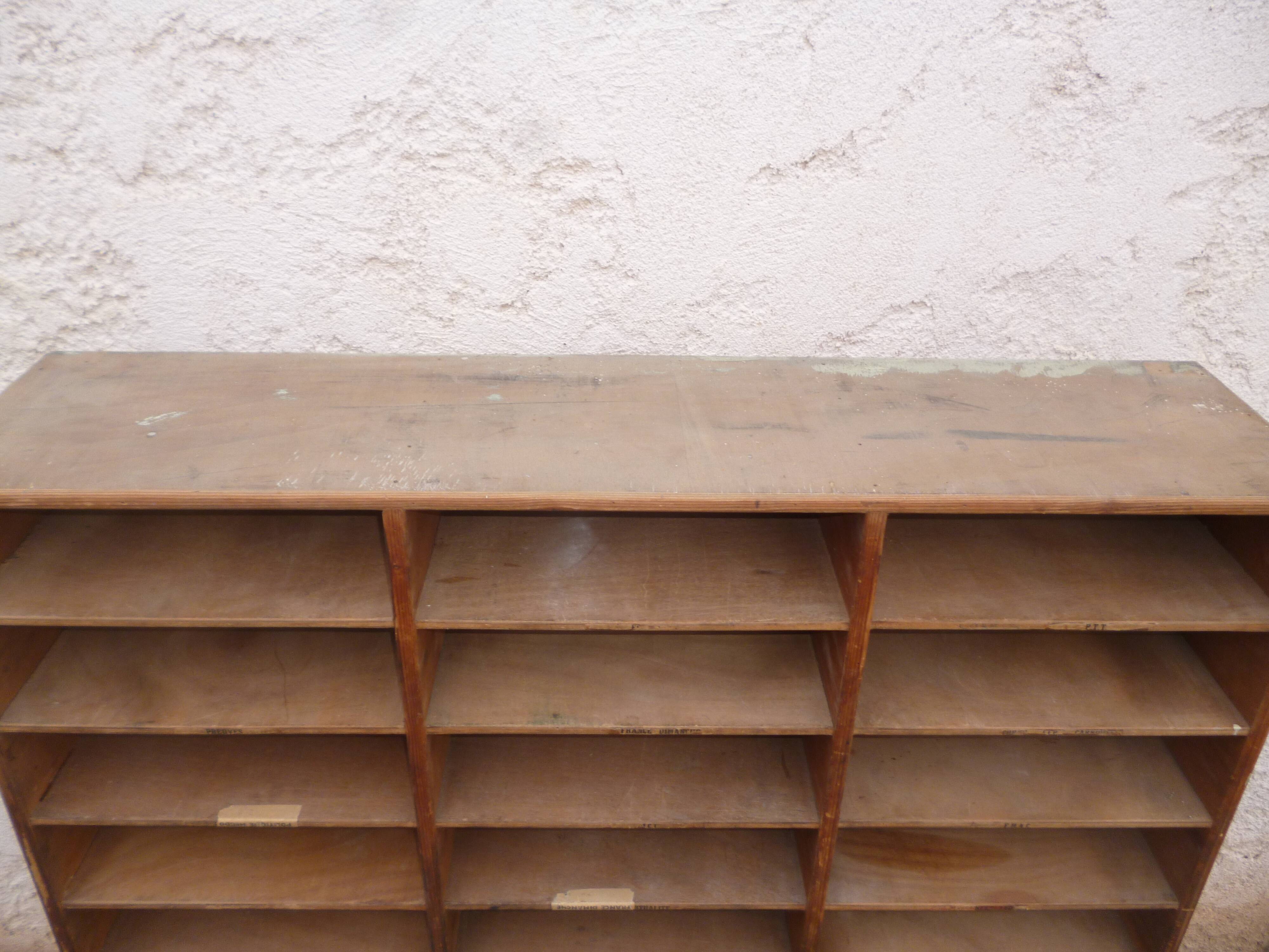 Sorting wood locker cabinet with Vintage labels