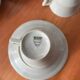 Art Deco cups and saucers by Théodore Haviland in celadon.