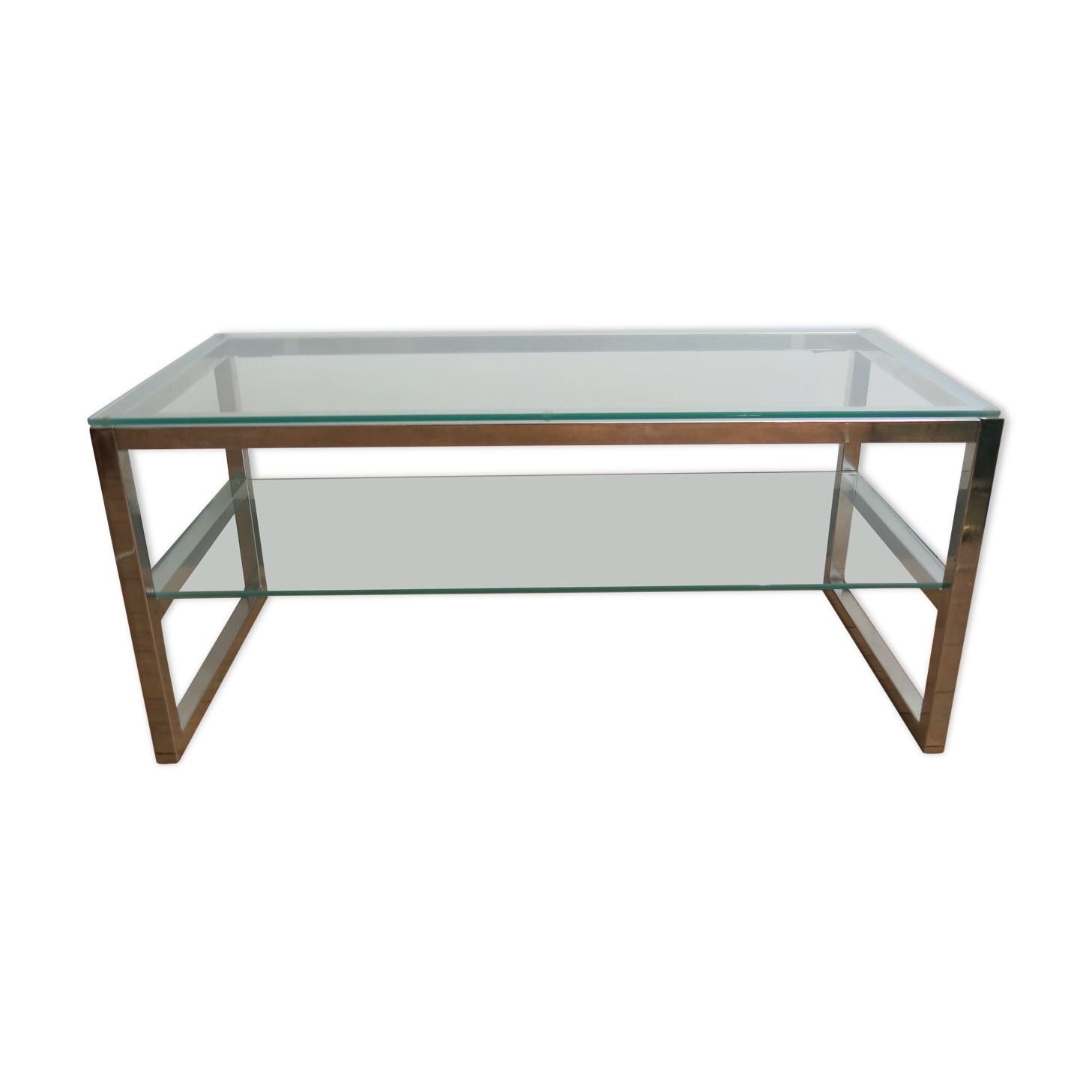Coffee table in glass and chromed metal