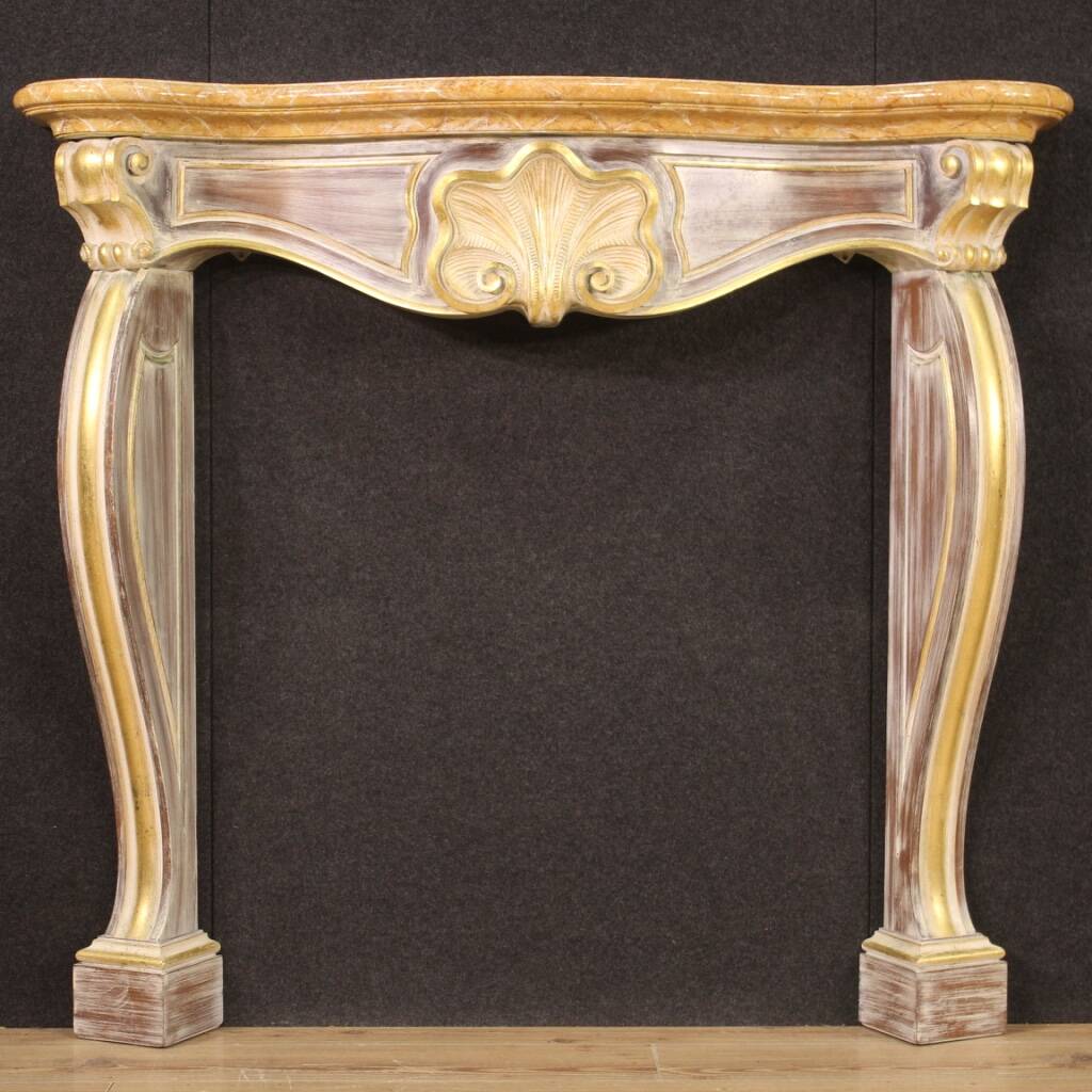 Scenic Italian painted and gilded wooden fireplace
