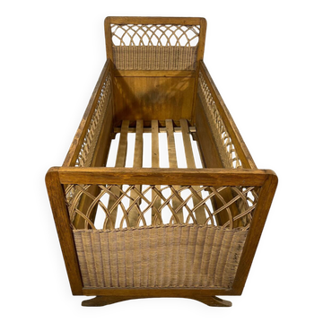 Wood and wicker children's bed from the 50s and 60s.