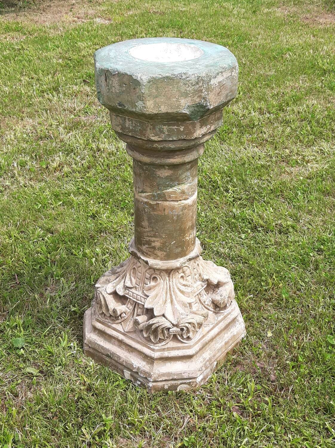Holy water font on stone column (17th century)