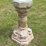 Holy water font on stone column (17th century)