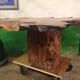 Table ronde taillée dans une tranche en bois de bout de PADOUK