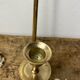 Solid brass bow and ribbon wall candle holder