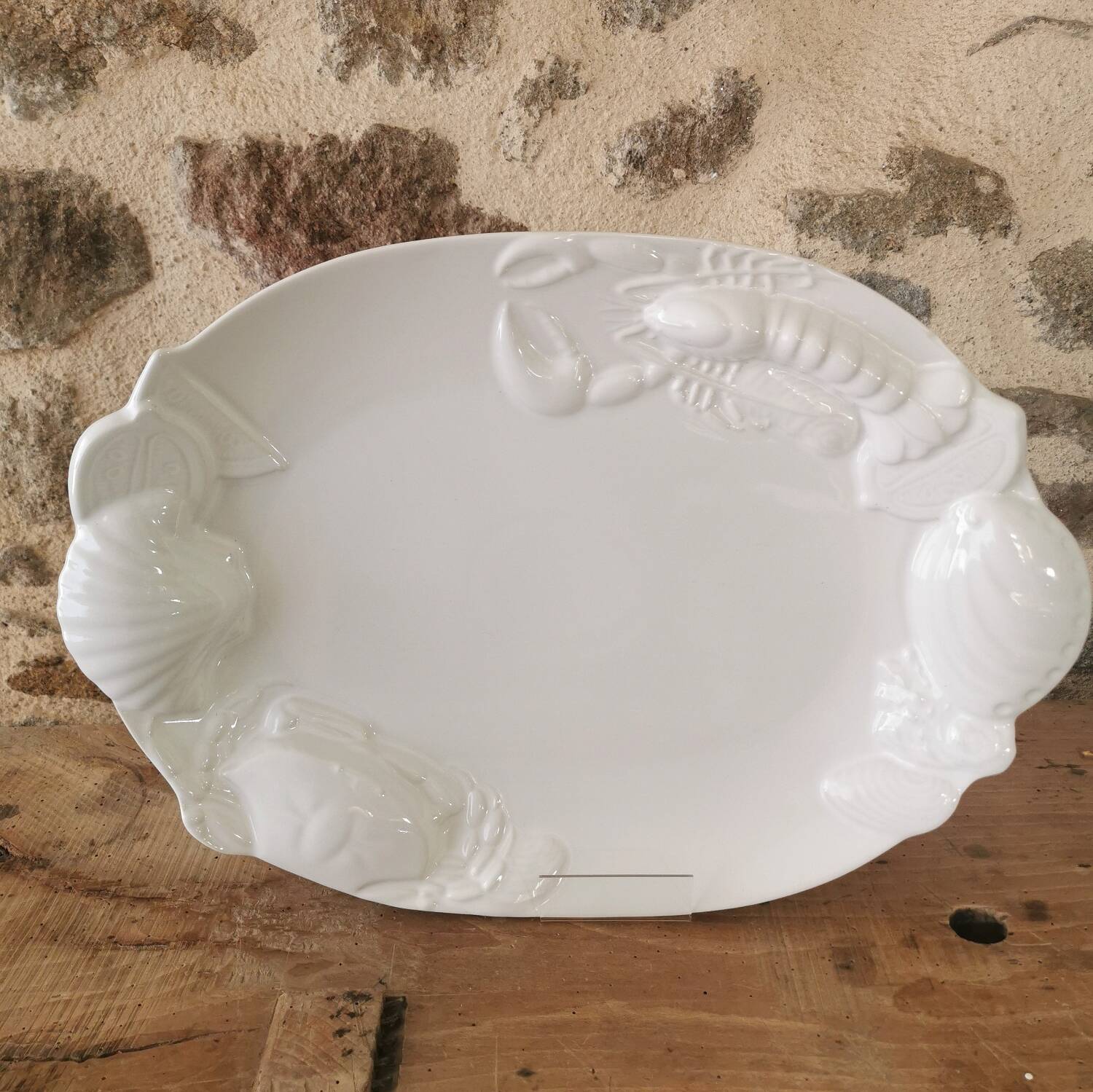Large white Barbotine shellfish dish