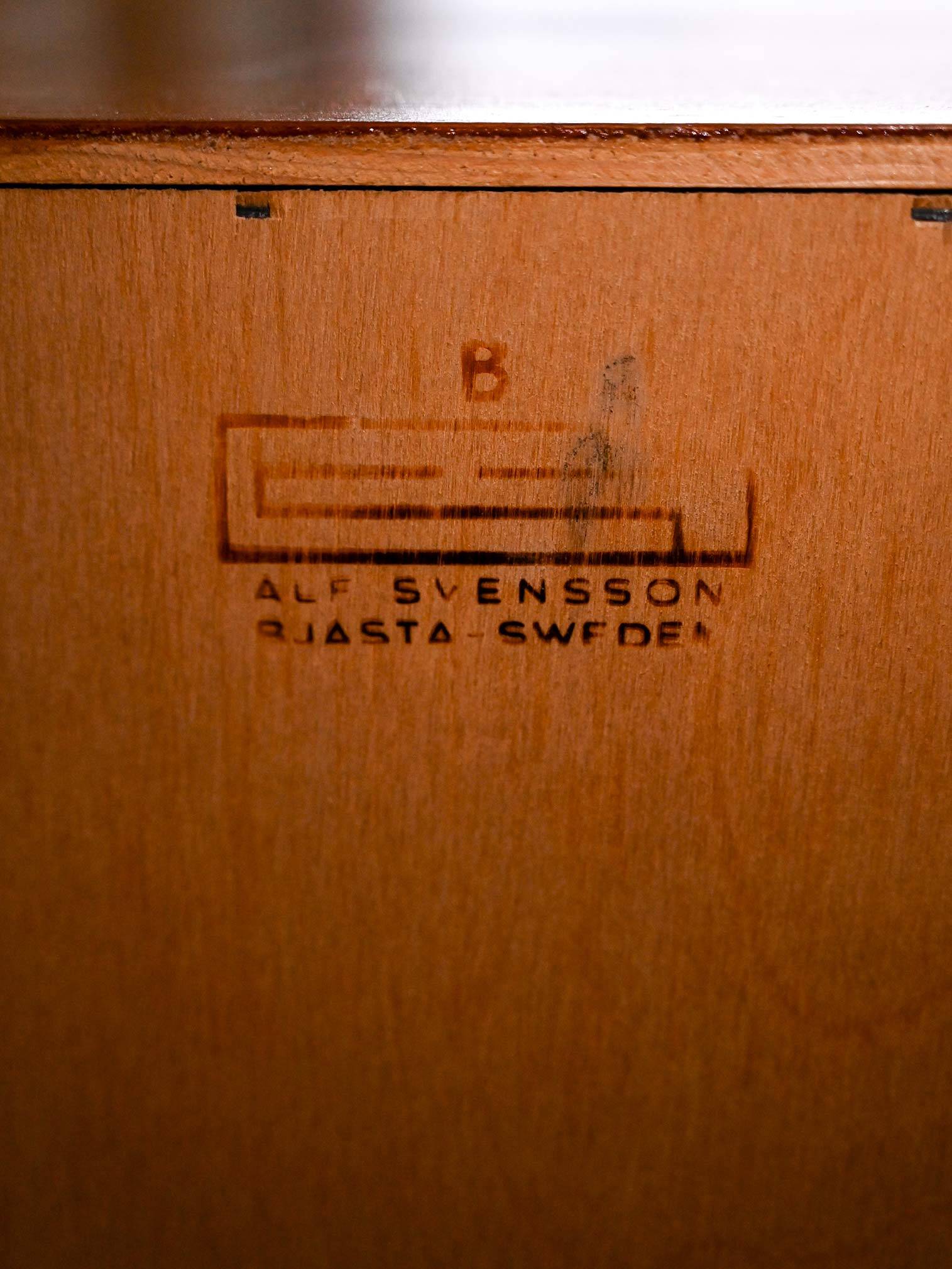 Scandinavian oak cabinet with woven rattan doors