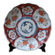 Ancienne assiette creuse Imari à décor de fleurs rouge et bleu 21.5cm