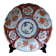 Ancienne assiette creuse Imari à décor de fleurs rouge et bleu 21.5cm